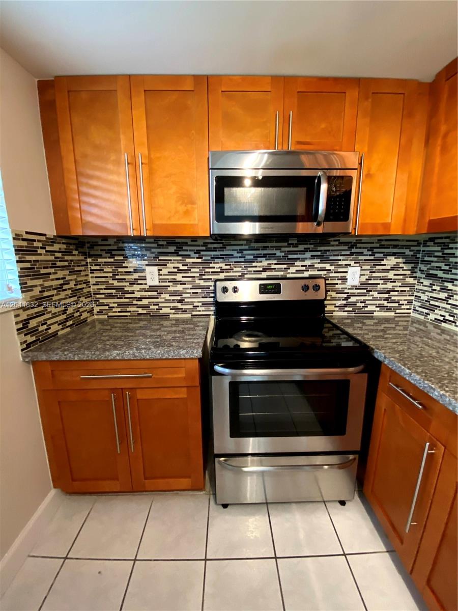 9280 FONTAINEBLEAU BL # 103, Miami FL 33172