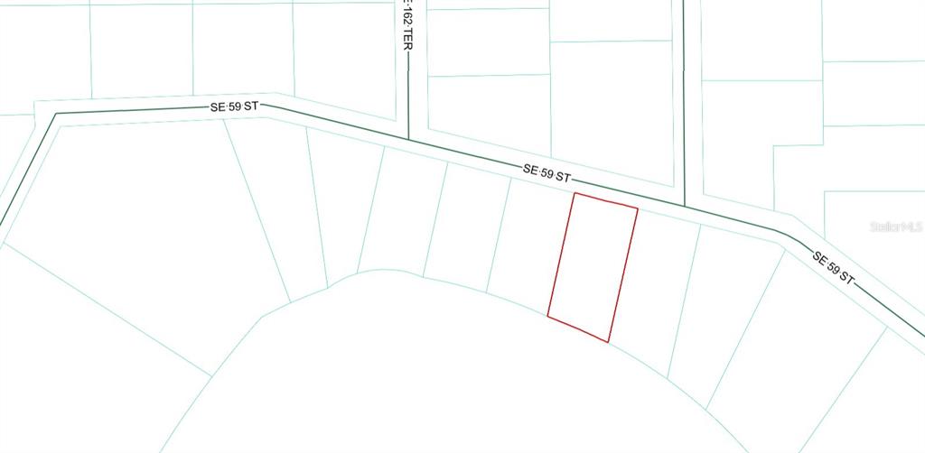 This is a property map showing a highlighted rectangular lot along a curved street — 0 SE 59TH PLACE, OCKLAWAHA, FL