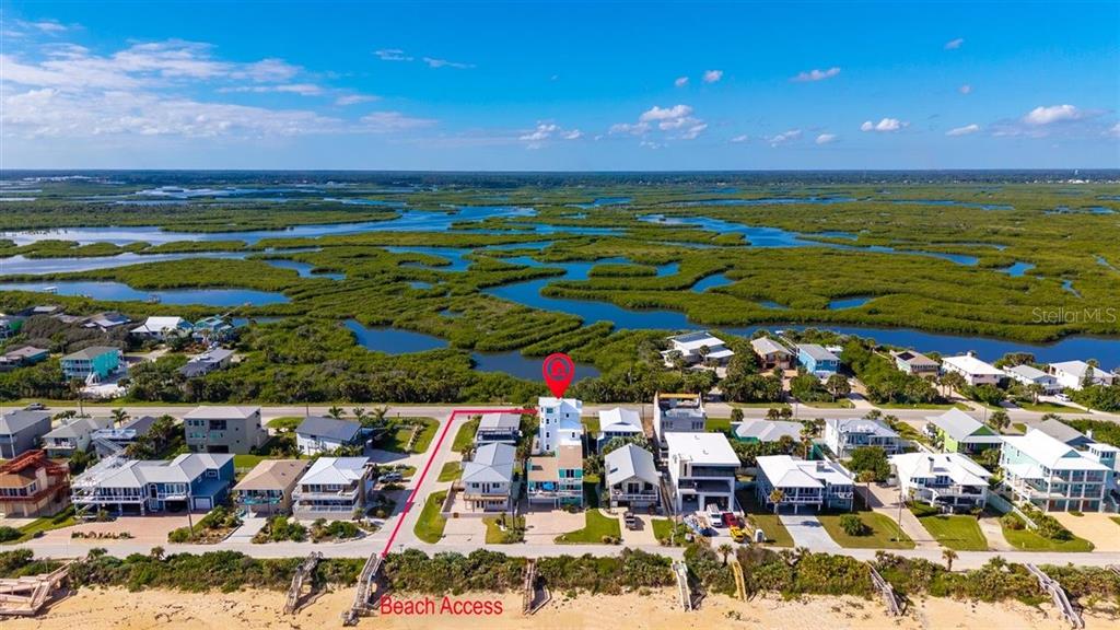 An aerial view shows a beach house with a red pin and marked beach access — 6191 TURTLEMOUND ROAD, NEW SMYRNA BEACH, FL