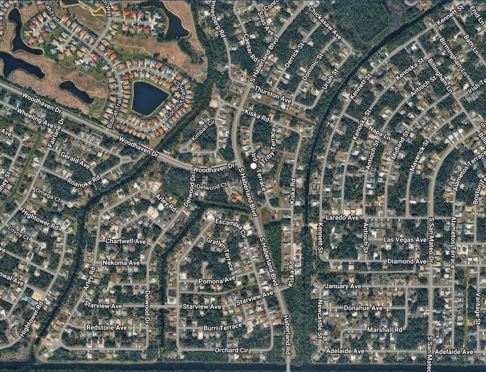 This is an aerial map view of a residential neighborhood with streets and houses — IRDELL TERRACE, NORTH PORT, FL