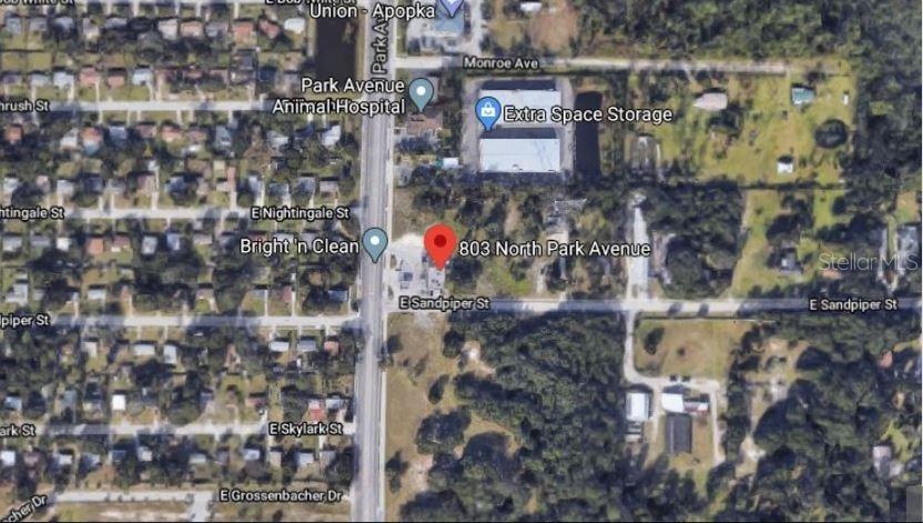 This is an aerial map view showing a commercial property location and surrounding streets — 803 N PARK AVENUE, APOPKA, FL