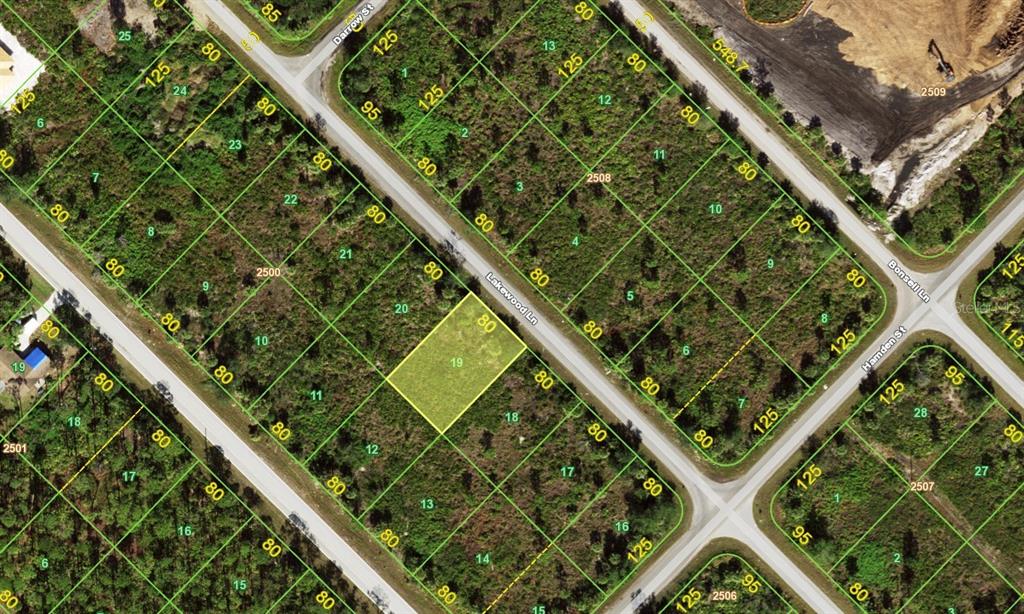 This is a satellite map showing a residential subdivision with vacant, undeveloped lots — 357 LAKEWOOD LANE, PORT CHARLOTTE, FL