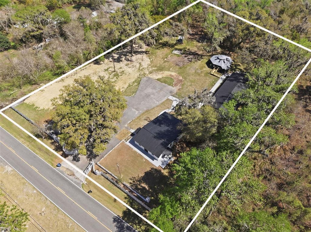 This is a floor plan showing the layout of a multi-room residential living space — 15458 SNOW MEMORIAL HIGHWAY, BROOKSVILLE, FL