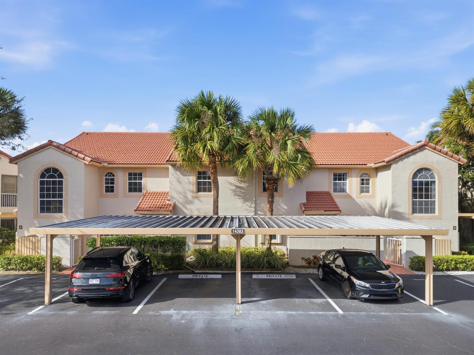 A two-story building with a tiled roof and a covered parking area for two cars — 14383 Via Royal # 3, Delray Beach FL 33446, DELRAY BEACH, FL