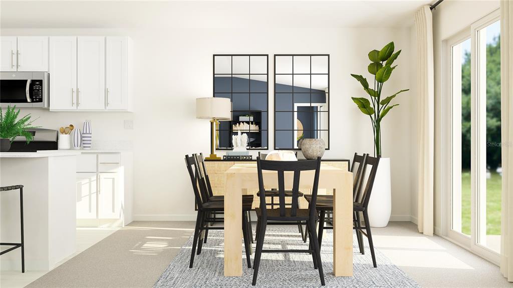 This is a digital rendering of a dining area adjacent to a white kitchen — 6030 BLUE PALOMA COURT, PALMETTO, FL