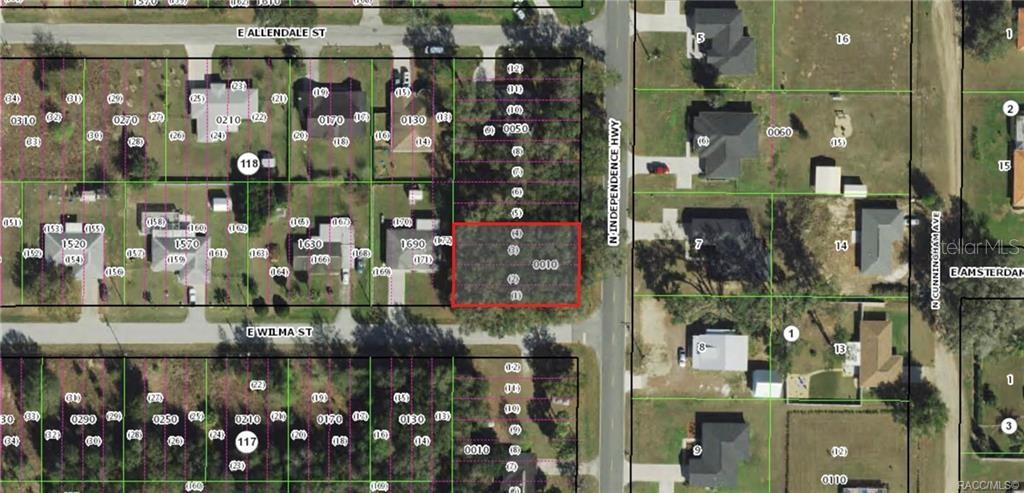 This is an aerial map showing a vacant lot highlighted in red along a road — 4133 E WILMA STREET, INVERNESS, FL