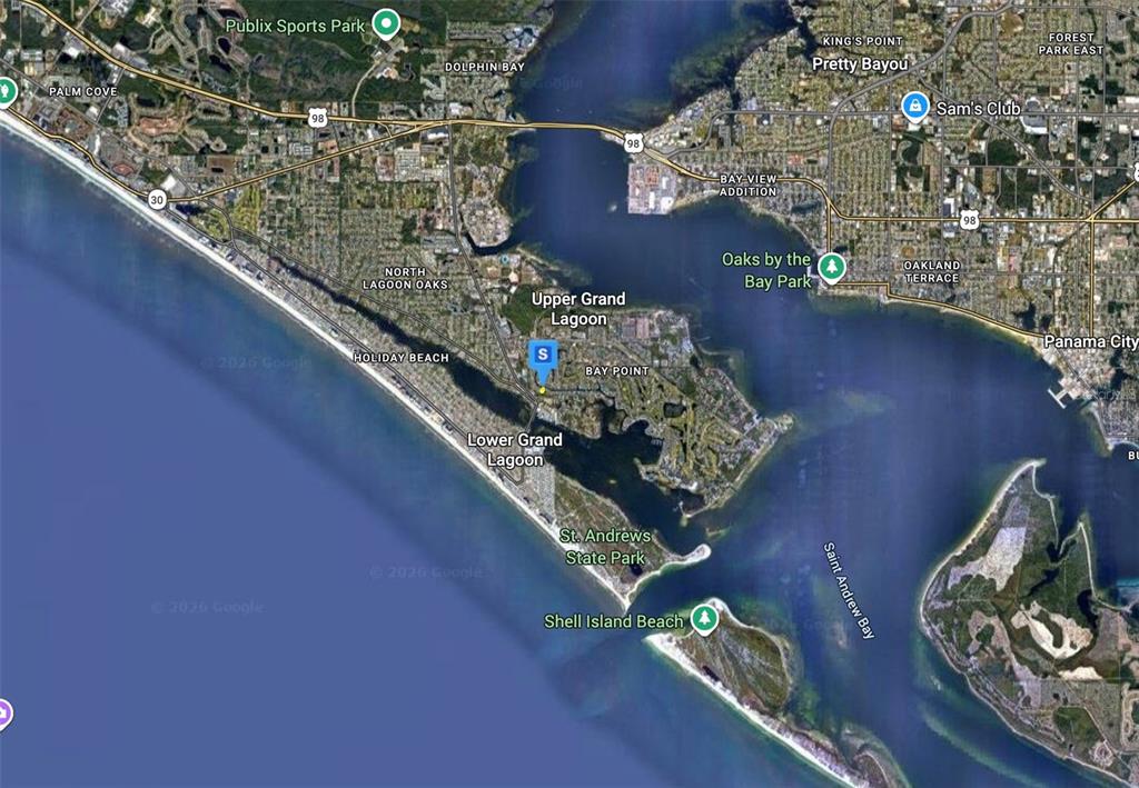 This is a satellite map view of the Grand Lagoon area in Panama City, Florida — 475 WAHOO ROAD, PANAMA CITY BEACH, FL