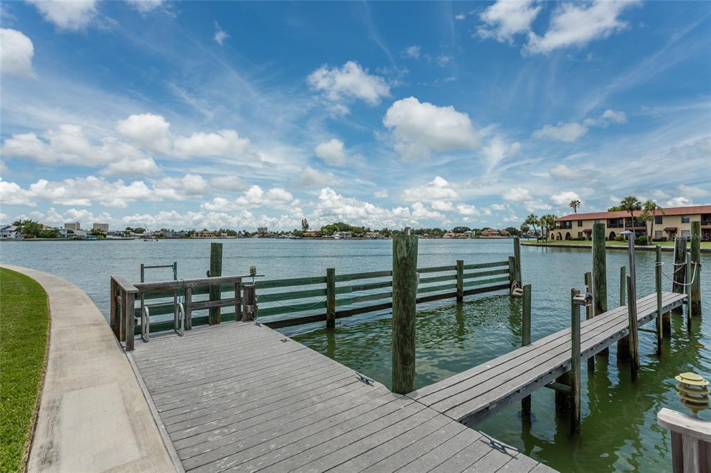 This floor plan shows the layout of a three-story residential property with a garage — 505 SANDY HOOK ROAD UNIT 505, TREASURE ISLAND, FL