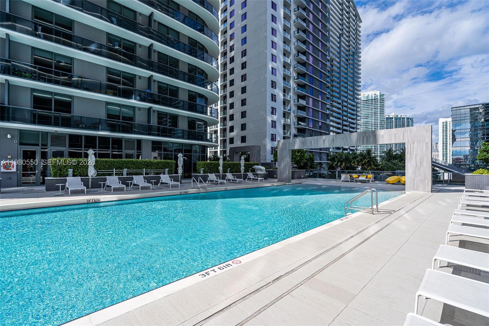 An aerial view shows the modern skyscrapers and urban architecture of the Brickell City Centre — 55 SW 9th St # 1109, Miami FL 33130, MIAMI, FL