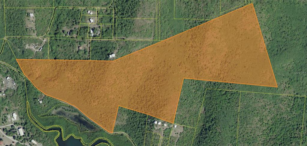 An aerial map view shows a large, irregularly shaped plot of land highlighted in orange — 250 km. BARRIO FRAILE, CULEBRA, PR