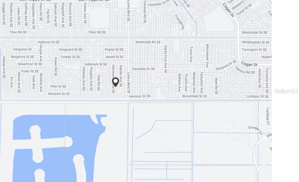 This image is a map showing residential streets and a large blue water feature — 3283 HAINSWORTH AVENUE SE, PALM BAY, FL