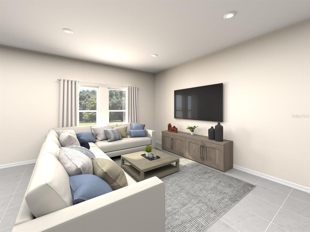 This is a digital rendering of a living room featuring a sectional sofa and television — 12 GARNI DRIVE, PALM COAST, FL