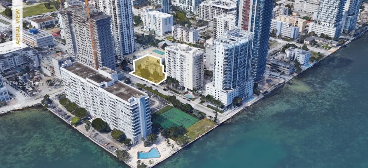 An aerial view shows a highlighted building lot surrounded by high-rise residential towers and water — 601 NE 22nd St, Miami FL 33137, MIAMI, FL