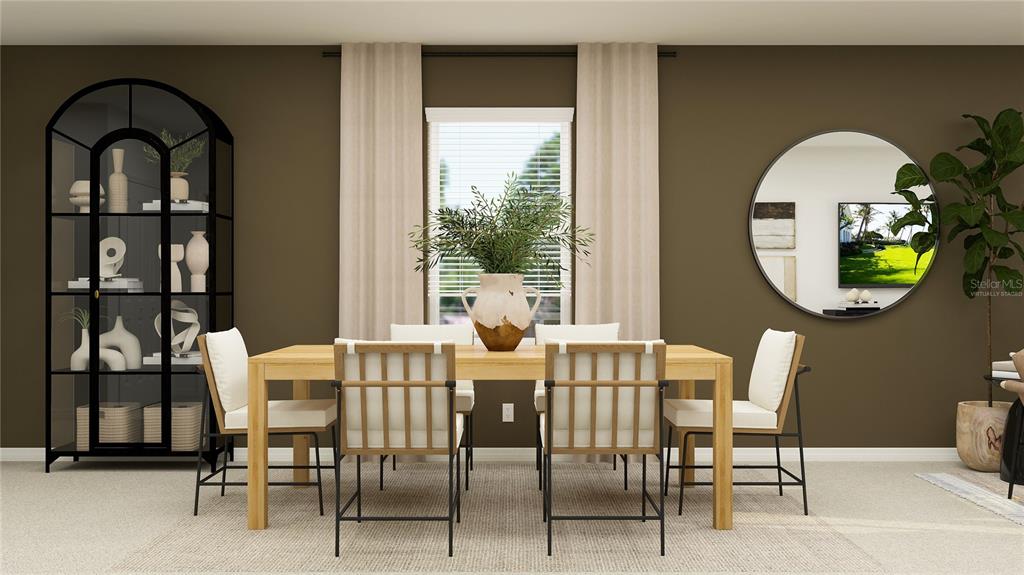 A dining room features a wooden table, four chairs, a glass cabinet, and a round mirror — 2439 BLUESTONE ROAD, HAINES CITY, FL