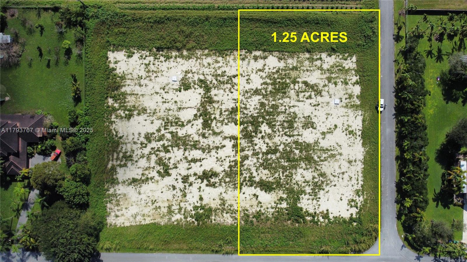 An aerial view shows a rectangular, undeveloped plot of land marked as 1.25 acres — 21298 SW 238th ST, Miami FL 33031, MIAMI, FL