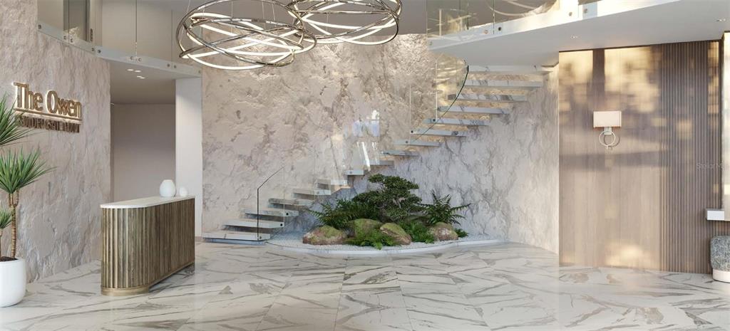 This rendering shows a modern lobby with a floating staircase, stone wall, and marble flooring — 325 GOLDEN GATE POINT UNIT 604, SARASOTA, FL