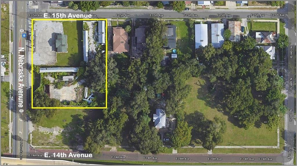 This aerial map shows a rectangular property outlined in yellow between two city streets — 2305 N NEBRASKA AVENUE, TAMPA, FL