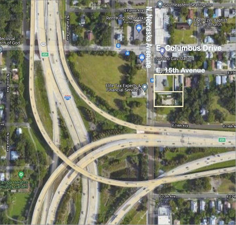 This is a satellite map view showing a highlighted property near a highway interchange — 2305 N NEBRASKA AVENUE, TAMPA, FL