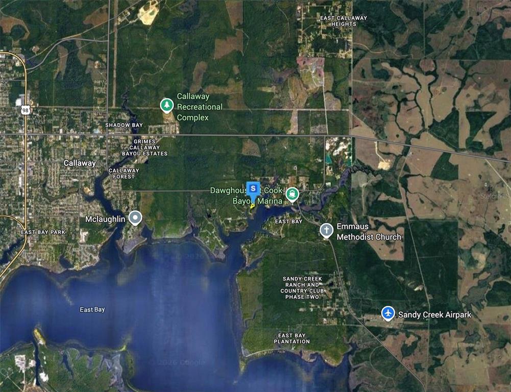 This is a satellite map showing the area around Dawghouse Bayou Marina in Callaway, Florida — 702 ISLAND COURT, PANAMA CITY, FL