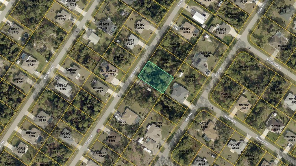 This is an aerial map view showing a vacant residential lot highlighted in green — TOLUCA TERRACE Lot 10 & 11, NORTH PORT, FL