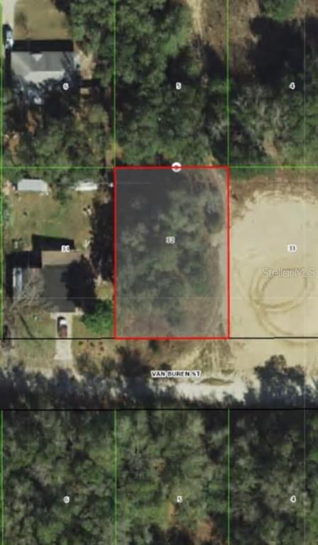 This is an aerial map showing a rectangular, wooded vacant lot outlined in red — 2808 VAN BUREN STREET W, INVERNESS, FL