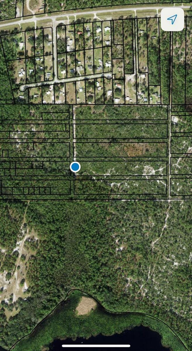An aerial map shows a grid of undeveloped land parcels with a lake at the bottom — 0 Fourth Avenue, FL 34771, FL