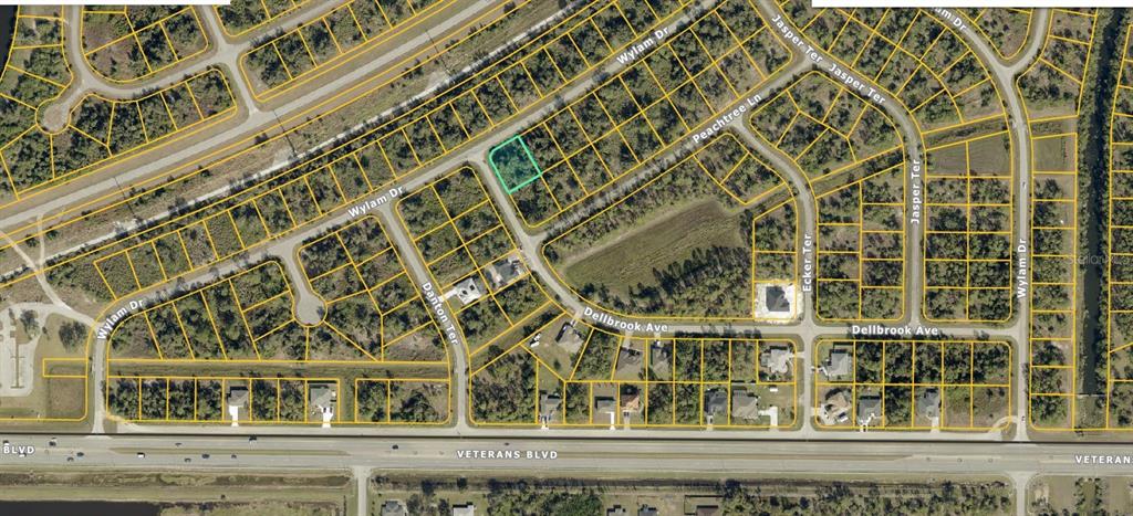 An aerial map view shows a highlighted vacant residential lot situated within a suburban neighborhood — Lot 1 WYLAM DRIVE, NORTH PORT, FL