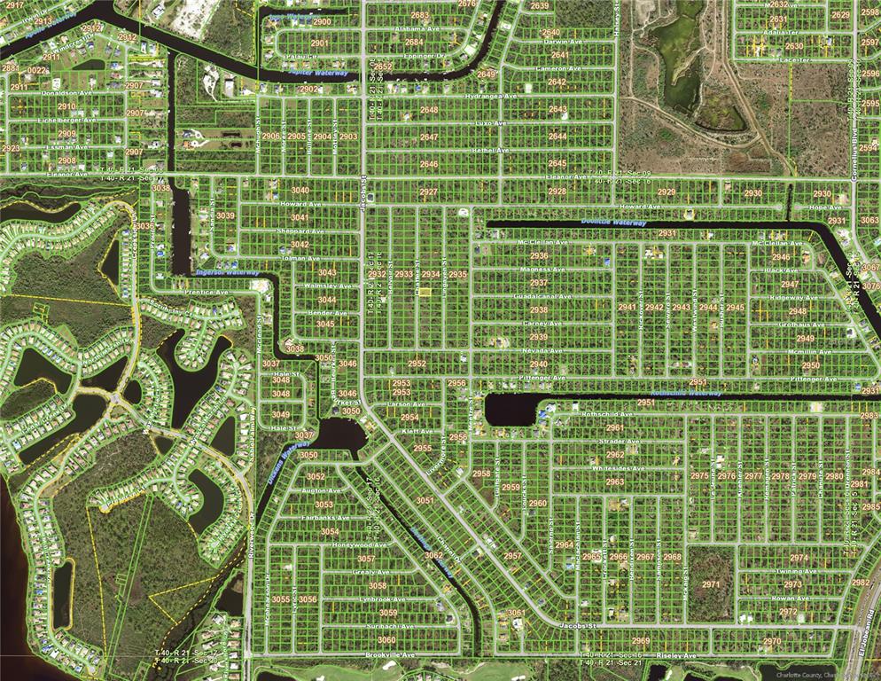 This is an aerial map showing a grid of residential streets and waterways in Florida — 2128 CHAFFEE STREET, PORT CHARLOTTE, FL