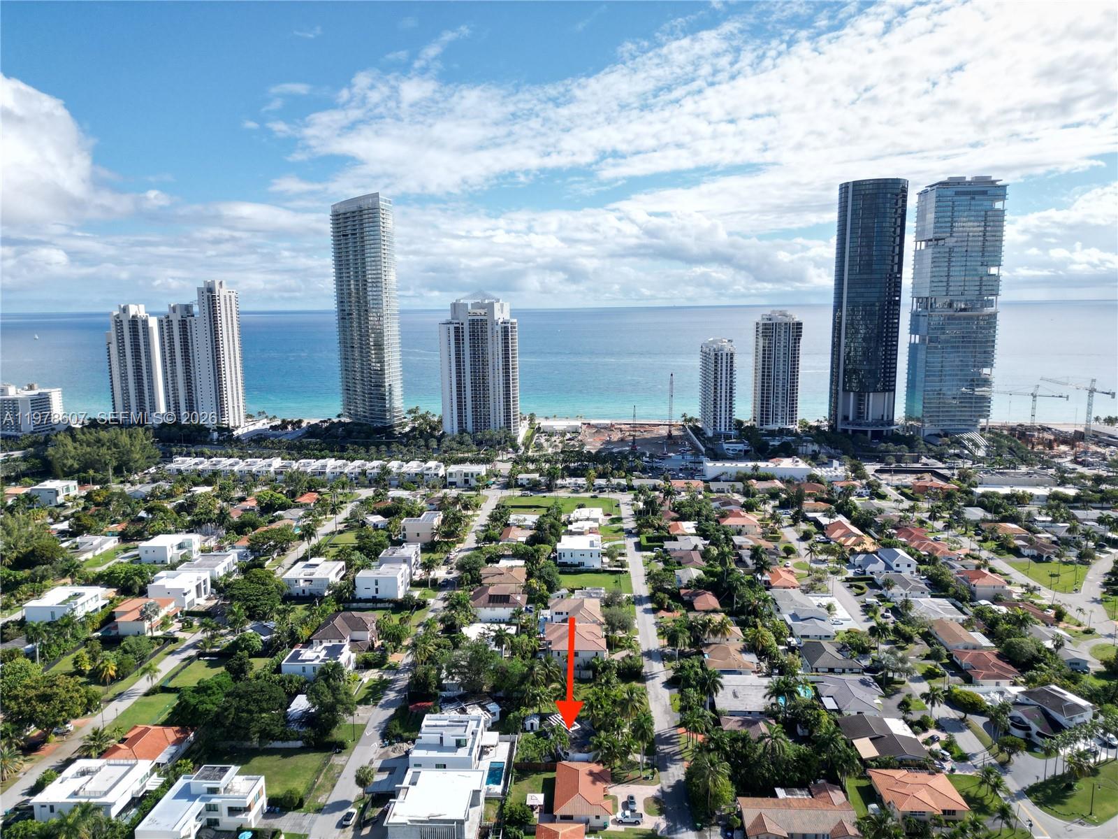 An aerial view shows a residential neighborhood with a red arrow pointing toward a house — 331 188th St, Sunny Isles Beach FL 33160, SUNNY ISLES BEACH, FL