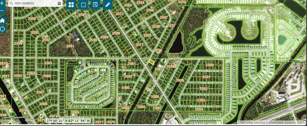 This is a digital map showing property parcel boundaries and street layouts in a residential area — 1562 BRIGHTWATER TERRACE, PORT CHARLOTTE, FL
