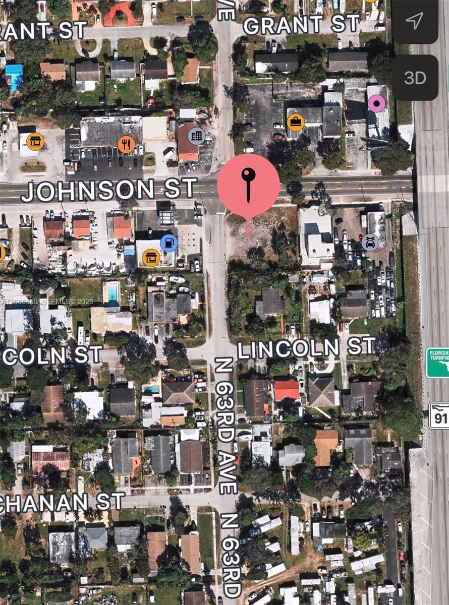 This is an aerial map view showing a vacant lot marked by a red pin — N 63rd Ave, Hollywood FL 33024, HOLLYWOOD, FL