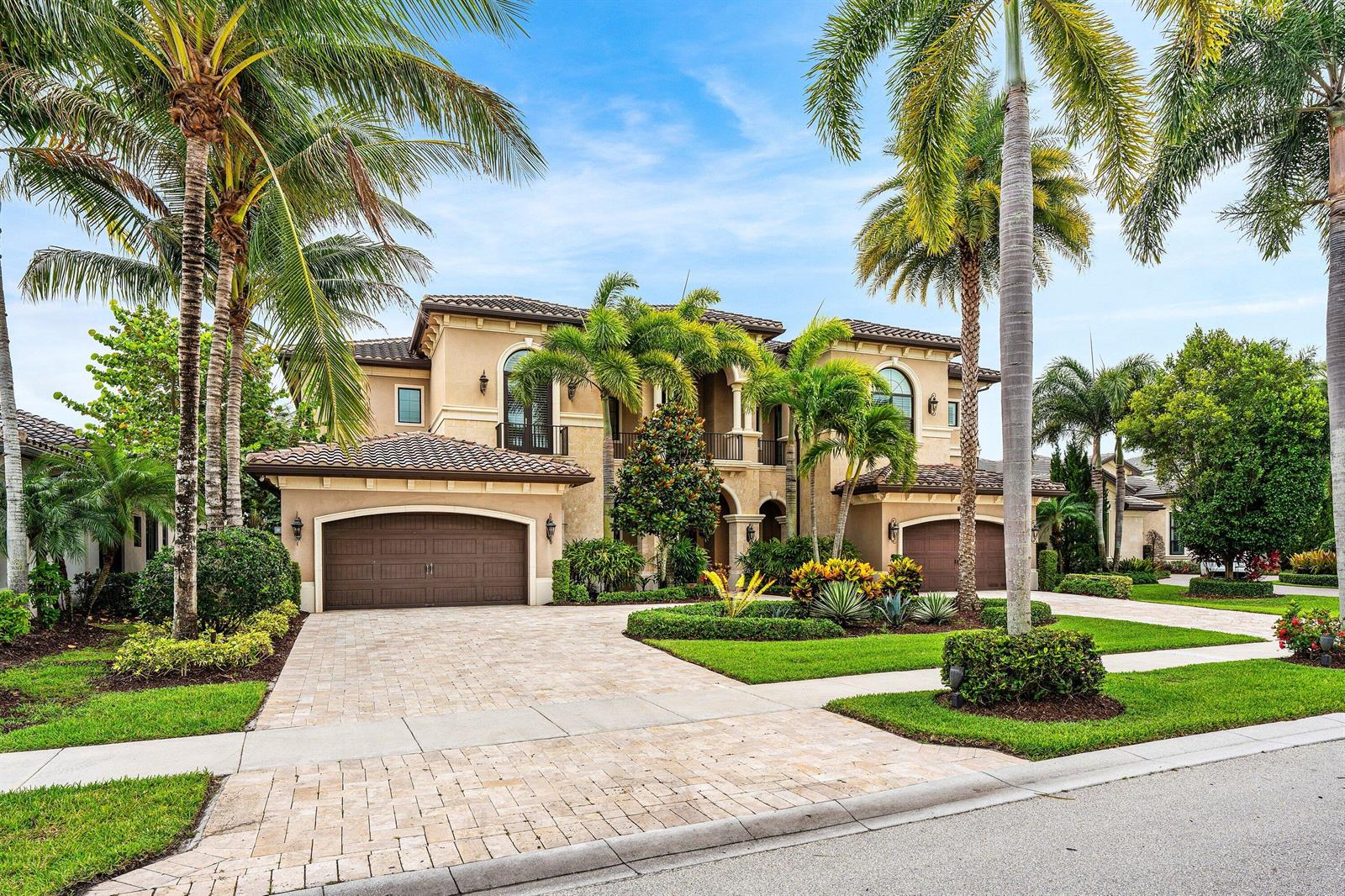 A two-story stucco house with a tile roof, two garages, and palm trees in front — 9616 Moritz Way, Delray Beach FL 33446, DELRAY BEACH, FL