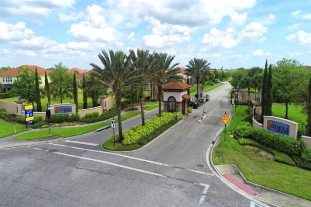 An aerial view of the gated entrance to the Solterra Resort community — 4353 ACORN COURT, DAVENPORT, FL