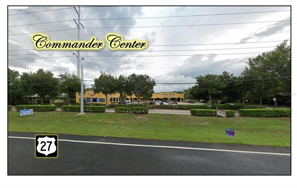 A view of the Commander Center commercial plaza from across a highway — 27900 US HIGHWAY 27 HIGHWAY, LEESBURG, FL
