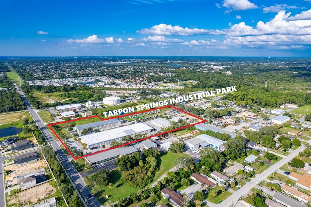 An aerial view shows the Tarpon Springs Industrial Park outlined in red — 1500 L AND R INDUSTRIAL BOULEVARD Bldg. D, TARPON SPRINGS, FL