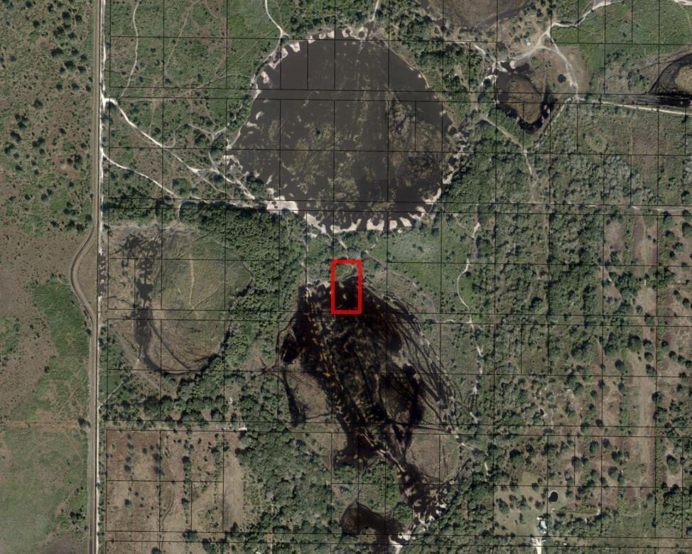 This is an aerial map showing a rectangular property parcel highlighted in red — 0 298th Street, Okeechobee FL 34972, OKEECHOBEE, FL