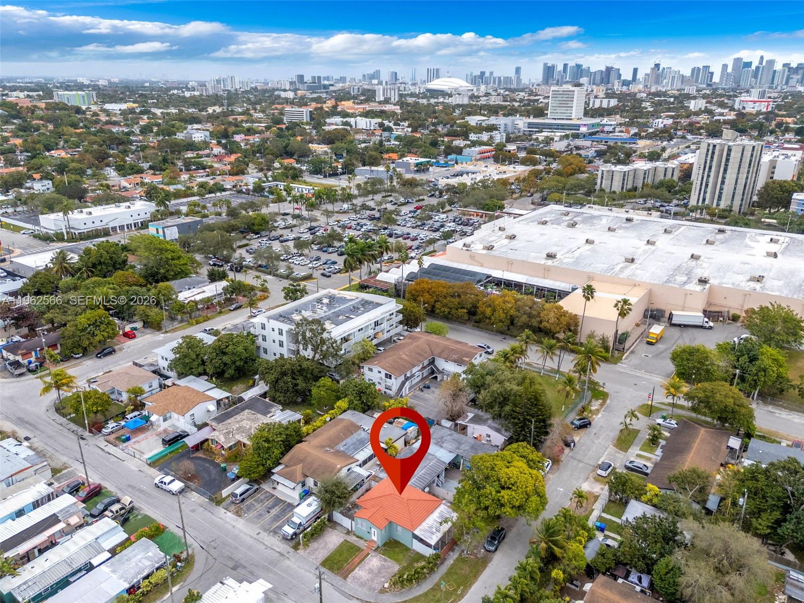 An aerial view shows a single-story house with a red tile roof and a red pin — 941 SW 31st Ct, Miami FL 33135, MIAMI, FL
