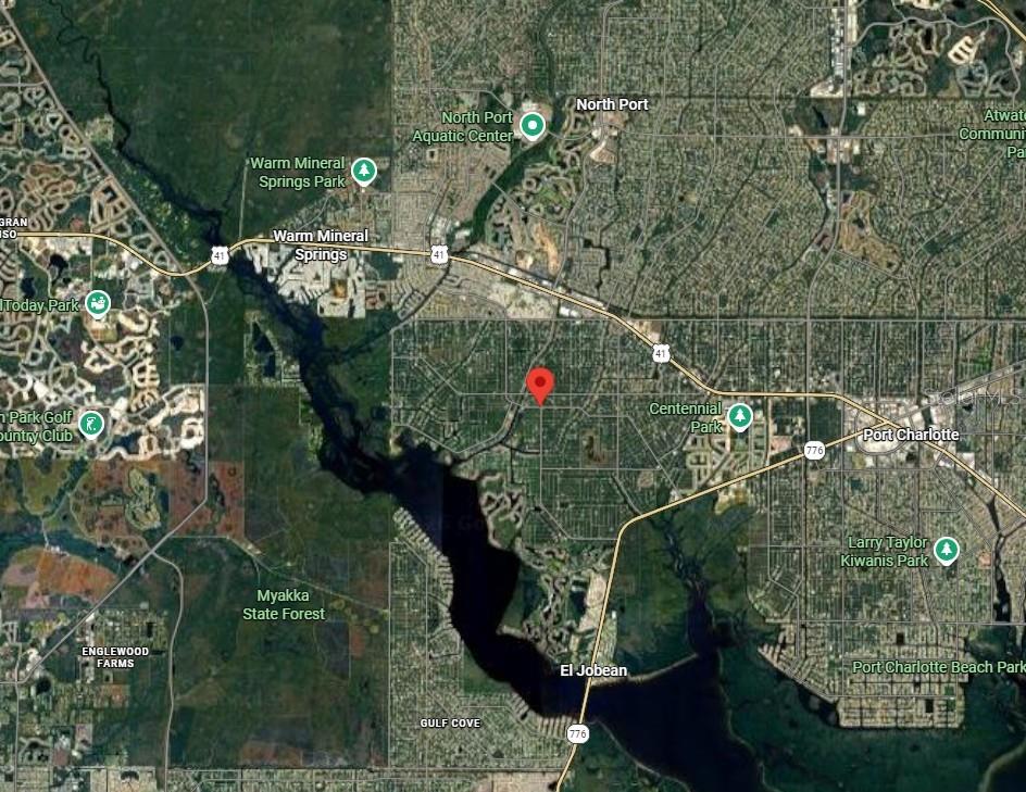 This is a satellite map showing the area surrounding North Port and Port Charlotte, Florida — 1087 JACOBS STREET, PORT CHARLOTTE, FL