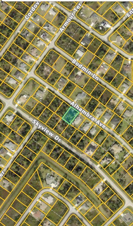 This is a satellite map view showing a highlighted residential lot in a suburban neighborhood — ALHAMBRA AVENUE, NORTH PORT, FL