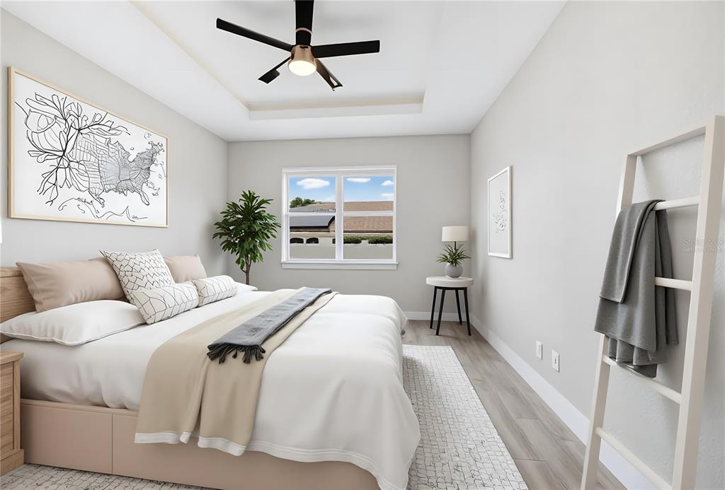This is a rendering of a bedroom featuring a tray ceiling, ceiling fan, and bed — 806 COLVILLE DRIVE, KISSIMMEE, FL