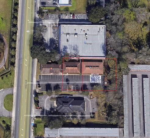 This aerial map shows a commercial property with two adjacent buildings and a parking lot — 949 LANE AVENUE S, JACKSONVILLE, FL