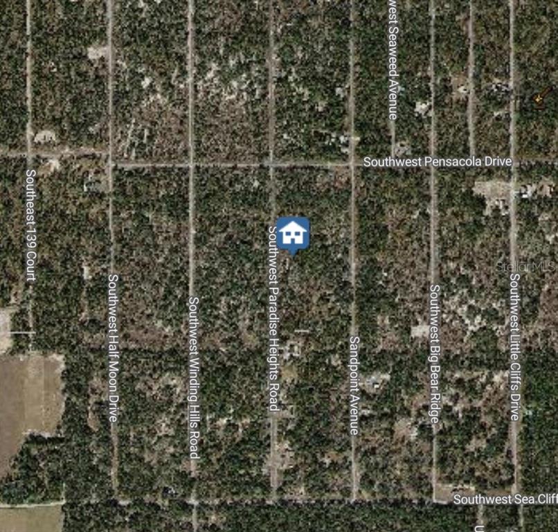 This is an aerial map showing a plot of land with surrounding streets and vegetation — 000 SW PARADISE HEIGHTS ROAD, DUNNELLON, FL