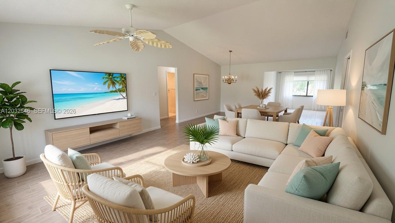A single-story house with a beige exterior, tiled roof, and a two-car garage — 7905 Cloverfield Cir, Boca Raton FL 33433, BOCA RATON, FL