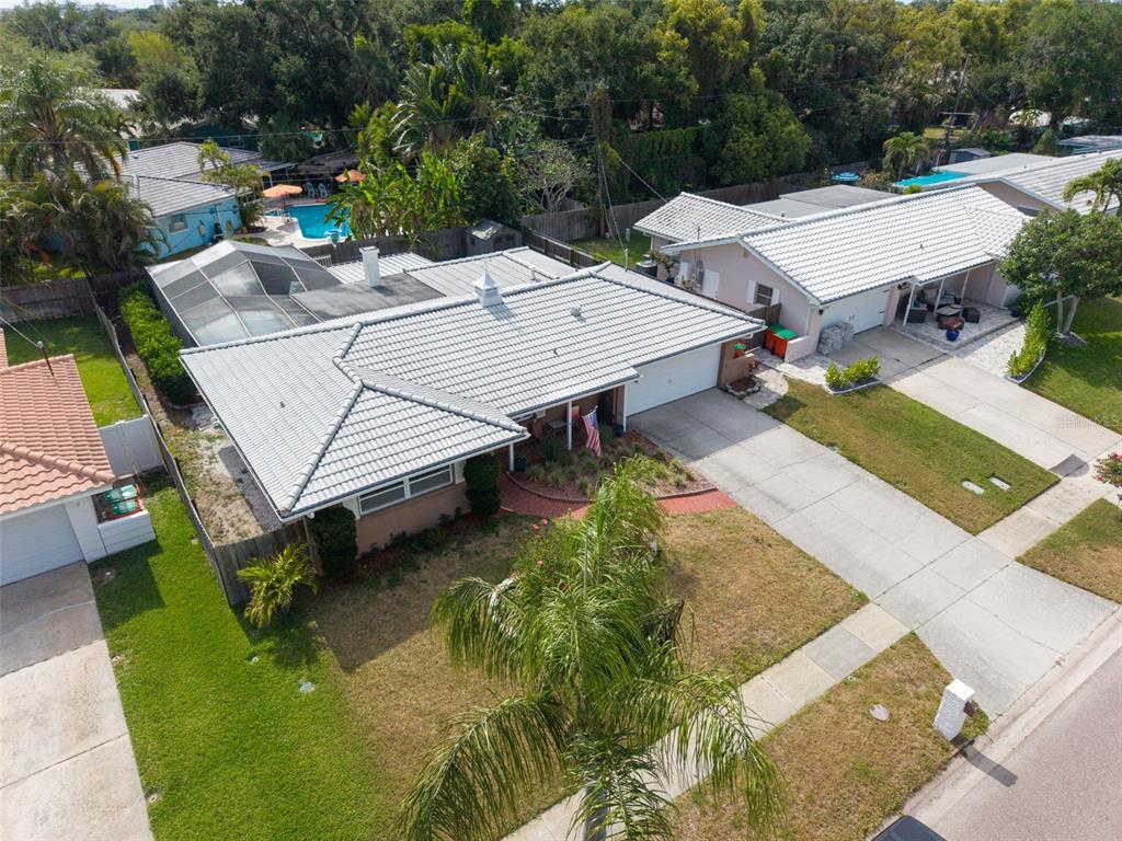 An aerial view of a single-story house with a gray tile roof and driveway — 5676 WILLIAMS BOULEVARD, SEMINOLE, FL