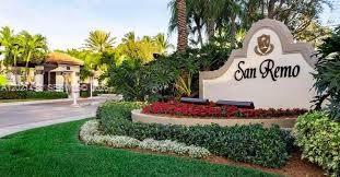 The entrance to the San Remo community features a large sign, landscaping, and a guardhouse — 800 Sorrento Dr. # 2, Weston FL 33326, WESTON, FL