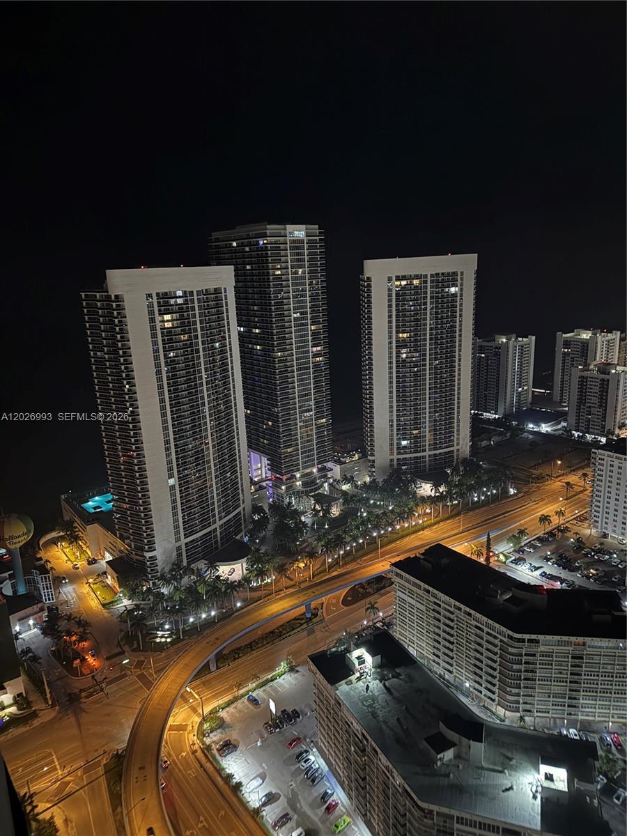 An elevated night view of high-rise apartment buildings and a multi-lane road — 1830 S Ocean Dr # 3003, Hallandale Beach FL 33009, HALLANDALE BEACH, FL