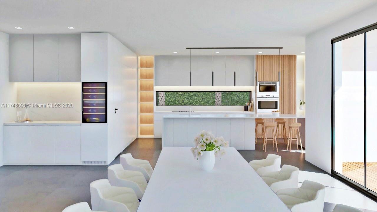 This rendering shows a modern kitchen and dining area with white cabinetry and wood accents — 1409 Hollywood Blvd, Hollywood FL 33020, HOLLYWOOD, FL