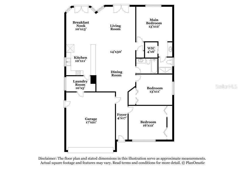 This is a floor plan showing a three-bedroom house with a garage and open living area — 13403 WOODWARD DRIVE, HUDSON, FL