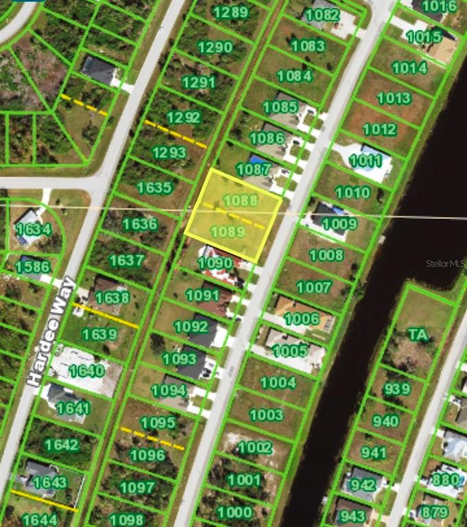 This is an aerial map showing two adjacent vacant lots highlighted in yellow — 279 BOUNDARY BOULEVARD, ROTONDA WEST, FL