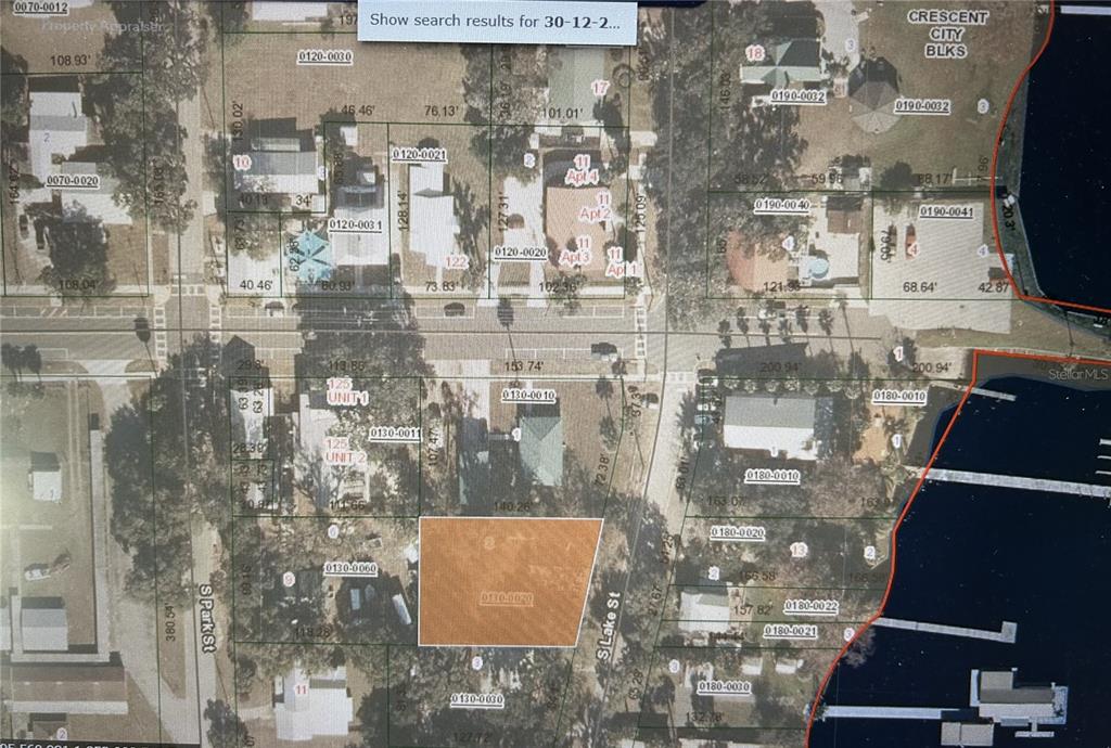 This is a property tax map showing parcel boundaries and lot dimensions in a residential area — 14 S LAKE STREET, CRESCENT CITY, FL